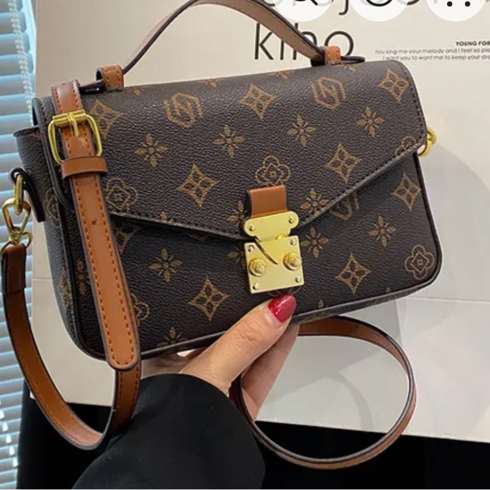 Stylish Brown Crossbody Bag with Gold Accents